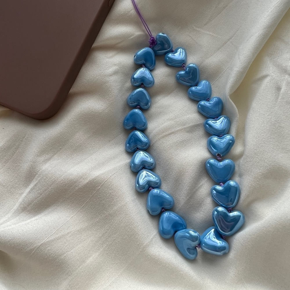 Phone charm with blue hearts